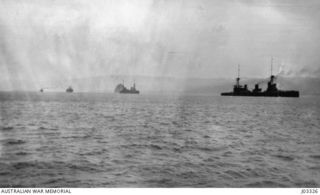 THE FLEET, HEADED BY THE FLAGSHIP "AUSTRALIA", ENTERING RABAUL ON 1914-09-12. (DONATED BY LT.-COM. G.A. HILL, RNR.)