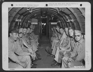 News Correspondents And Officers Aboard A Douglas C-47 Bound For Tinian, Marianas Islands, For Their Pacific Press Tour. They Are, Left To Right: Major Bob Reese, Pro, Guam; Colonel W. W. Wheaton, Atc; Major George Carrol, Atc; Bill Shippen; Gill Robb Wil (U.S. Air Force Number 75072AC)