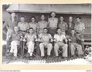 LAE, NEW GUINEA. 1945-11-12. THE STAFF OF 8 SECTION AUSTRALIAN OFFICERS' SHOP