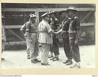 TOROKINA, BOUGAINVILLE. 1945-03-24. GENERAL SIR THOMAS A. BLAMEY, COMMANDER-IN-CHIEF, ALLIED LAND FORCES, SOUTH WEST PACIFIC AREA (7), MEETS 26 INFANTRY BRIGADE UNIT COMMANDERS DURING HIS TOUR OF ..