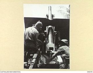 AITAPE, NEW GUINEA. 1945-03-10. ARTILLERY IN JUNGLE CONDITIONS. A NEW HIGH ANGLE 25-POUNDER POSITION INSTALLED IN THE 6 DIVISION AREA BY 2/3 FIELD REGIMENT, ROYAL AUSTRALIAN ARMY PERSONNEL. ..