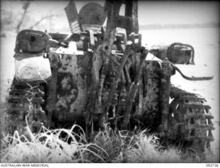 WEWAK AREA, NEW GUINEA, 1945-05-28. A REAR VIEW OF BACK OF A KNOCKED OUT JAPANESE TYPE 97 CHI-HA RECOVERY TANK SHOWING GENERAL CONSTRUCTION, WHICH WAS FOUND NEAR BORAM IN THE HQ 6 DIVISION AREA