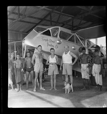 Sepik River Trading Company plane, in front from left - C Brush, Morton Johnston and B G Hall, Madang, Papua New Guinea