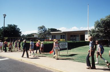 School children arrive for class at the Hickam Elementary School