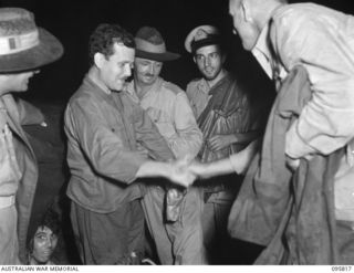 JACQUINOT BAY, NEW BRITAIN. 1945-09-07. AFTER THE JAPANESE SURRENDER, ALLIED PRISONERS, MOST OF THEM IN EMACIATED CONDITION, WERE PICKED UP AT RABAUL BY HMAS VENDETTA AND BROUGHT TO JACQUINOT BAY. ..