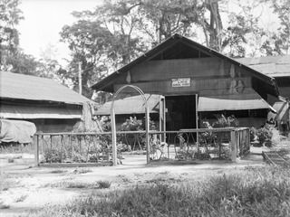 TOROKINA, BOUGAINVILLE, 1945-06-21. THE FRONT OF DETAIL NEW GUINEA SUB DEPOT, LHQ DENTAL STORES, HQ 4 BASE SUB AREA