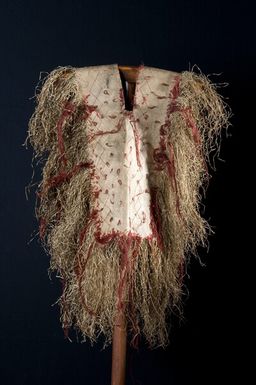 Shoulder dress of plaited pandan fibres decorated with red woollen thread