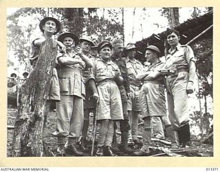 1942-10-08. IN THIS GROUP "SOMEWHERE IN NEW GUINEA", ARE LEFT TO RIGHT GENERAL BLAMEY; AN AUSTRALIAN GENERAL MR DRAKEFORD AND AIR VICE MARSHAL G. JONES. (NEGATIVE BY BOTTOMLEY)
