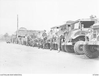 LAE, NEW GUINEA. 1944-04-03. THE TRANSPORT SECTION, HEADQUARTERS LAE BASE SUB-AREA. IDENTIFIED PERSONNEL ARE:- NX192141 PRIVATE W. NORRIS (1); S114427 PRIVATE T.R. KEILY (2); S112719 PRIVATE W.T. ..