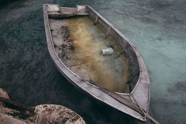 Sinking boat, Nukunonu, Tokelau