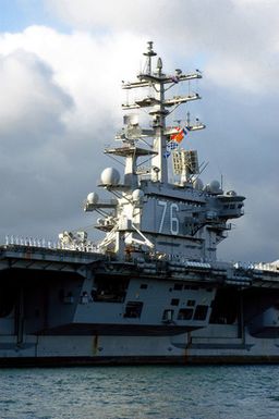 The US Navy (USN) Nimitz Class Aircraft Carrier USS RONALD REAGAN (CVN 76) pulls into Naval Station (NS) Pearl Harbor, Hawaii (HI), for a scheduled port visit. The REAGAN and USN Carrier Air Wing 14(CVW-14) are completing a deployment in support of the Global War on Terrorism (GWOT) and Maritime Security Operations (MSO) in the Pacific Ocean