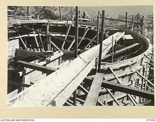 PORT MORESBY, NEW GUINEA. 1944-05-24. THE NO.1 GUN EMPLACEMENT AT BASILISK BATTERY, 801ST ANTI-AIRCRAFT AND COAST ARTILLERY BATTERY, HEADQUARTERS MORESBY BASE SUB-AREA. THE EMPLACEMENT, VIEWED ..