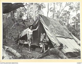 PAPUA, NEW GUINEA. 1942-10. PRESS CORRESPONDENTS CAMP IN THE FORWARD AREA