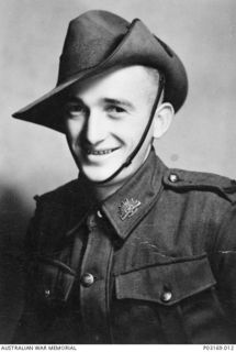 Studio portrait of WX2657 Private (Pte) Lionel T. Mason, 2/16 Battalion. Pte Mason was killed in action in New Guinea on 1 December 1942