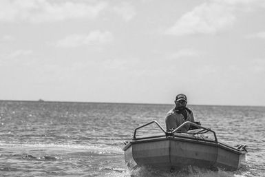 Man in boat, Atafu, Tokelau