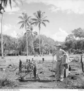 1942-11-23. NEW GUINEA. KOKODA. THE JAPANESE CARRIED OUT A SCORCHED EARTH POLICY BEFORE THEY LEFT KOKODA. THIS IS THE REMAINS OF A PLANTER'S HOME NEAR KOKODA. (NEGATIVE BY G. SILK)