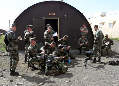 US Marine Corps Sergeant Hobbs from the 1ST Battalion, 3rd Marines, Weapons Company, gives a class on the MK-19 at Pohakuloa Training Area on the Big Island of Hawaii