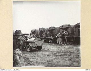 CAPE WOM, NEW GUINEA. 1945-09-27. A GROUP OF VEHICLES WHICH FORM THE MOBILE BRIGADE, 110 BRIGADE ORDNANCE FIELD PARK