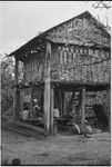 Land litigation meeting: under chief's house in Tukwaukwa, villagers listen to proceedings