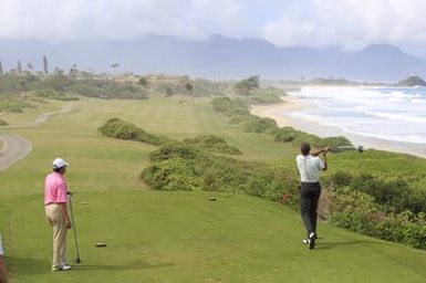 Barack Obama plays golf with Prime Minister Najib Razak, Joe Paulsen, and Mike Brush in Kaneohe Bay, Hawaii, December 24, 2014