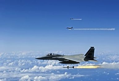 Three U.S. Air Force F-15 Eagle aircraft fire AIM-7 Sparrow radar-guided air-to-air missiles at a tactical air-launched decoy over Hickam Air Force Base, Hawaii, July 16, 2006, during Exercise Rim of the Pacific (RIMPAC) 2006. RIMPAC brings together military forces from Australia, Canada, Chile, Peru, Japan, the Republic of Korea, the United Kingdom and the United States. (U.S. Air Force photo by TECH SGT. Shane A. Cuomo) (Released)