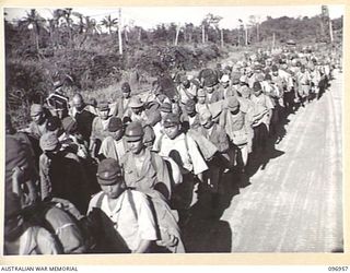 TOROKINA, BOUGAINVILLE. 1945-09-23. THE FIRST PARTY OF JAPANESE NAVAL TROOPS TO ARRIVE AFTER A 10-MILE MARCH FROM THE BUKA AREA, ESCORTED BY TROOPS OF 27 INFANTRY BATTALION. THE JAPANESE WERE ..