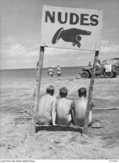 SCARLET BEACH, FINSCHHAFEN AREA, NEW GUINEA. 1944-03-13. THE SIGN MARKING THE SPOT FOR NUDE BATHING AT SCARLET BEACH