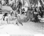 Group of Rongerik Island natives waiting for food to be distributed by Captain Engleman, summer 1947