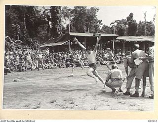 TOROKINA, BOUGAINVILLE, 1945-07-15. PRIVATE F. MULHEISEN, 12 ADVANCED WORKSHOP, WINNING THE 100 YARDS DURING THE COMBINED ALLIED SPORTS CHAMPIONSHIP MEETING AT GLOUCESTER OVAL ARRANGED BY ..