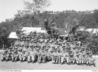 Port Moresby, Papua. 1944-08-08. Group portrait of Other Ranks of 128th Australian General Hospital. Identified personnel: Warrant Officer (WO) 2 K. Walne; WO 1 E. B. Flaxman; WO 2 F. Woodrow; WO 2 ..
