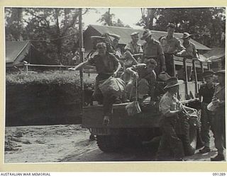 BOUGAINVILLE. 1945-04-26. NEW ARRIVALS AT 2/3 CONVALESCENT DEPOT, DEBUS AT THE RECEPTION CENTRE. THE DEPOT IS UNDER THE COMMAND OF LIEUTENANT-COLONEL M.M. ROSEFIELD