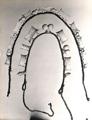 Photo of carved objects, possibly jewellery