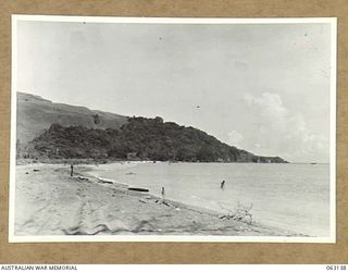 MASAWENG BEACH, NEW GUINEA. 1943-12-25. A JOIN-UP PHOTOGRAPH TAKEN FROM THE BEACH SHOWING FORTIFICATION POINT ON THE RIGHT (TO JOIN PHOTOGRAPH NO. 63137)