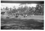 Bringing on, unloading, and laying out the tokonaki or ngāue, i.e. the pigs, kava, food, etc.