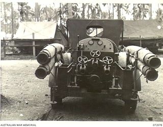 MILNE BAY, NEW GUINEA. 1944-04-04. A JUPITER TRAILER PUMP AT THE 2ND AUSTRALIAN BULK PETROLEUM STORAGE COMPANY. THE EQUIPMENT IS USED FOR FIRE FIGHTING AND IN PUMPING WATER INTO TANKS TO RAISE THE ..