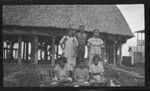 Group portrait in front of building