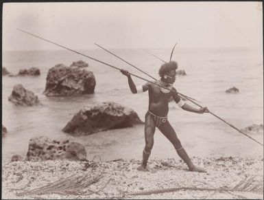 A man demonstrating spear fighting on a beach at Ahia, Ulawa, Solomon Islands, 1906, 1 / J.W. Beattie