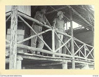 FINSCHHAFEN AREA, NEW GUINEA. 1944-04-25. THE HONOURABLE E.J. WARD, MINISTER FOR EXTERNAL TERRITORIES IN THE AUSTRALIAN GOVERNMENT (2), ACCOMPANIED BY MAJOR-GENERAL B.M. MORRIS, DSO, GOC AUSTRALIAN ..