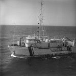 R/V Kana Keoki (ship) from the University of Hawaii at Manoa from the D/V Glomar Challenger (ship) while visiting a drilling site during the Deep Sea Drilling Project. 1979