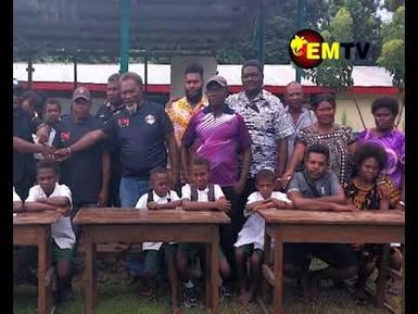 SCHOOL RECEIVES DESKS