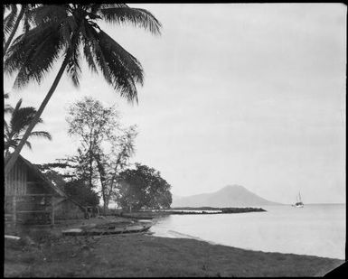 Beached canoe beside a hut with a schooner anchored off shore, Manam Island, New Guinea, 1935 / Sarah Chinnery