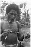 Man with shell money length