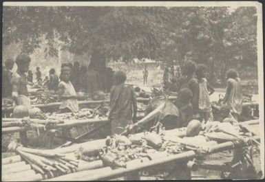 Rows of trestle tables, loaded with produce, Boong, native market, Rabaul, New Guinea, 1929 / Sarah Chinnery