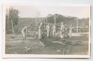 [Photograph of Soldiers Cleaning Up]