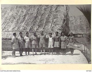 TARAWA ISLAND, GILBERT AND ELLICE ISLAND GROUP. 1945-09-27. COLONEL V. FOX-STRANGWAYS, RESIDENT COMMISSIONER OF THE GILBERT AND ELLICE ISLAND GROUP, AND HIS OFFICE STAFF