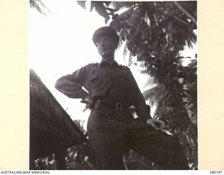 SIAR, NEW GUINEA. 1944-07-07. VX24235 BRIGADIER H.H. HAMMER, DSO, COMMANDING OFFICER 15TH INFANTRY BRIGADE, AT HEADQUARTERS 15TH INFANTRY BRIGADE