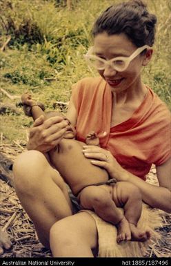 Pat holding baby girl