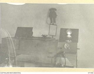 PORT MORESBY, PAPUA, NEW GUINEA. 1944-03-27. THE T.F.D. (LP) AUSTRALIA SHOWING LOCAL MODIFICATION AND ARRANGEMENTS OF 103 CONVERTER RECEIVER DIALS ON THE BEARING AND RANGE RECEIVER BRACKETS ON THE ..