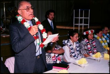 Man speech-making at Niuean ear-piercing ceremony, Auckland