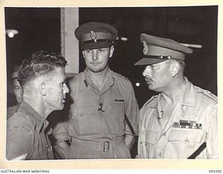 LAE AREA, NEW GUINEA, 1945-06-30. DURING HIS TOUR OF INSPECTION OF AUSTRALIAN TROOPS IN THE LAE AREA, HIS ROYAL HIGHNESS, THE DUKE OF GLOUCESTER, GOVERNOR-GENERAL OF AUSTRALIA (3), WHILE VISITING ..